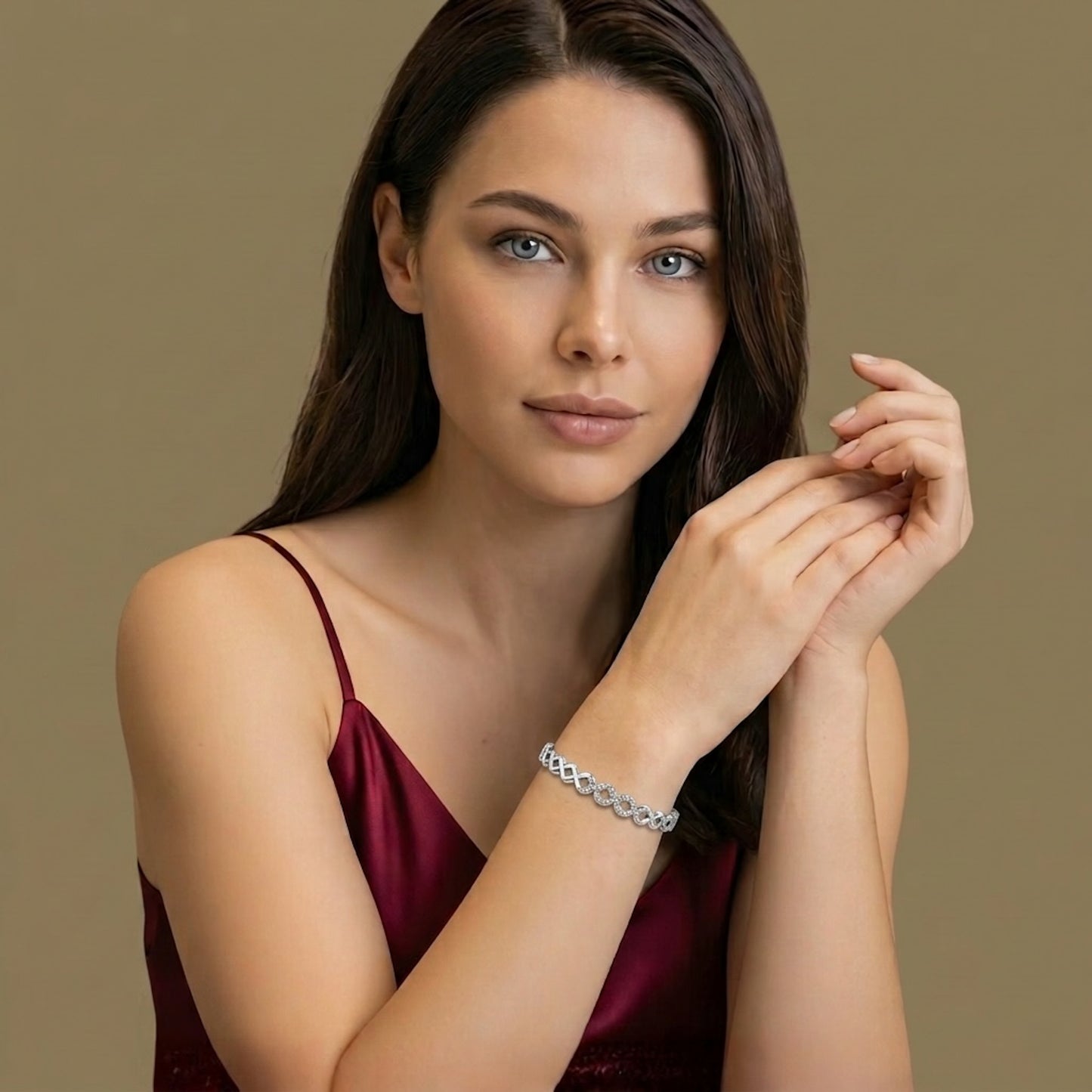 woman in red wearing link silver bracelet