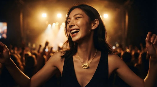 Raline Bergemann Golden Love Stories Statement Queen concert jewelry Switzerland — bold gold necklace earrings live music night editorial
