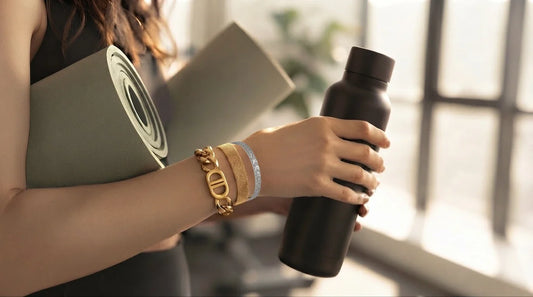 Raline Bergemann waterproof jewelry stacking Switzerland — gold bracelet stack hoops ring Daily Glow gym editorial active women