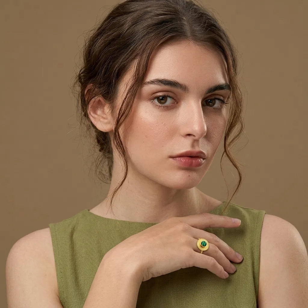 Woman wearing an adjustable 18K gold PVD waterproof ring by Raline Bergemann, Switzerland