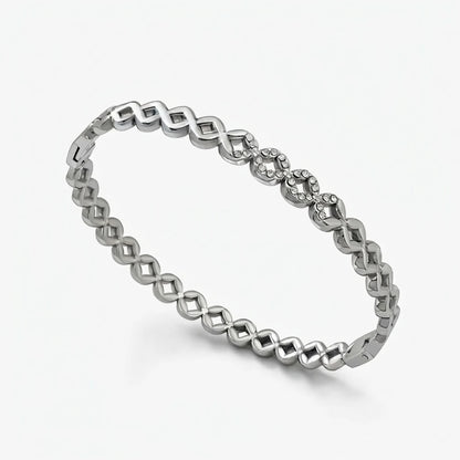 Silver ring with a crystals on a white background