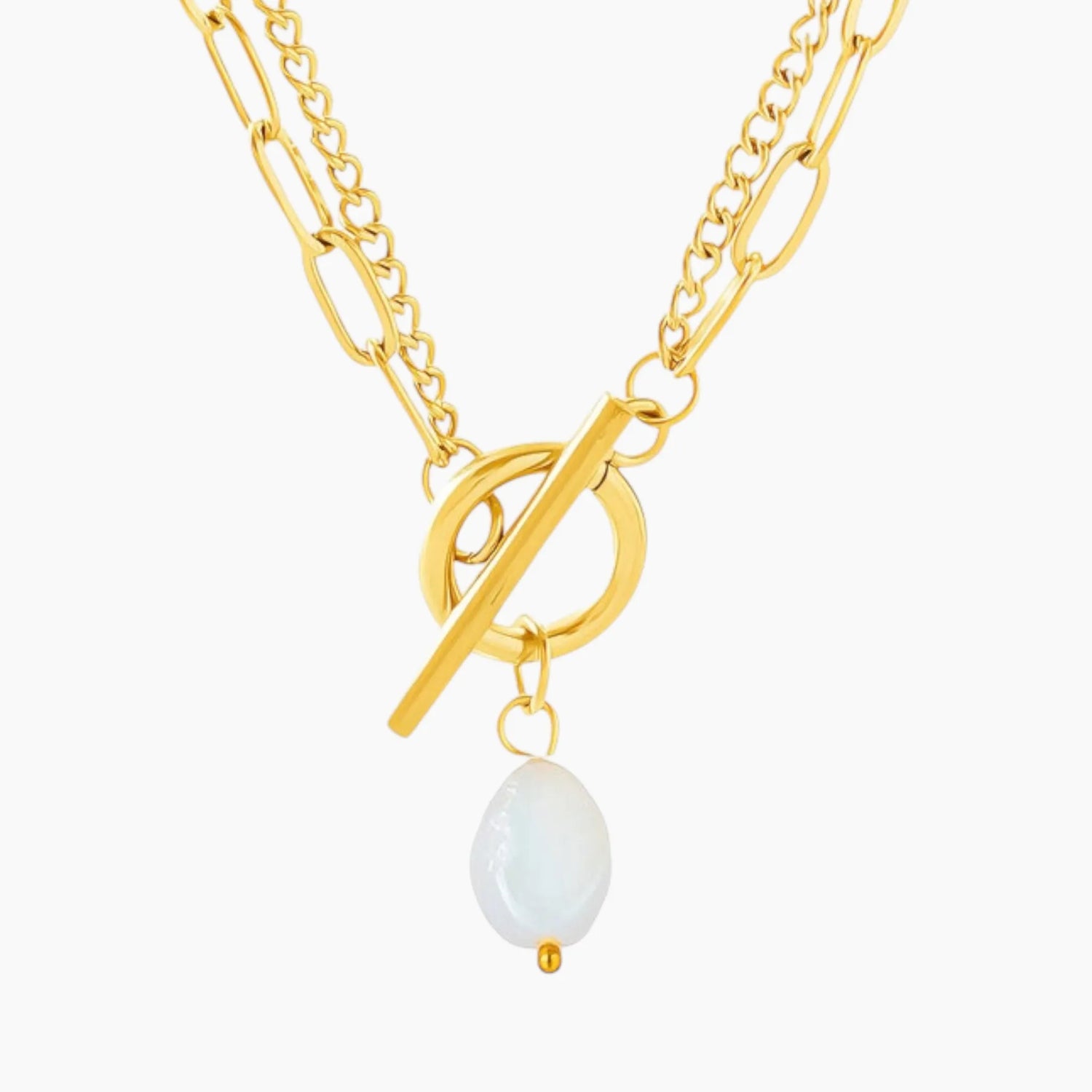Gold necklace with a white pendant on a white background