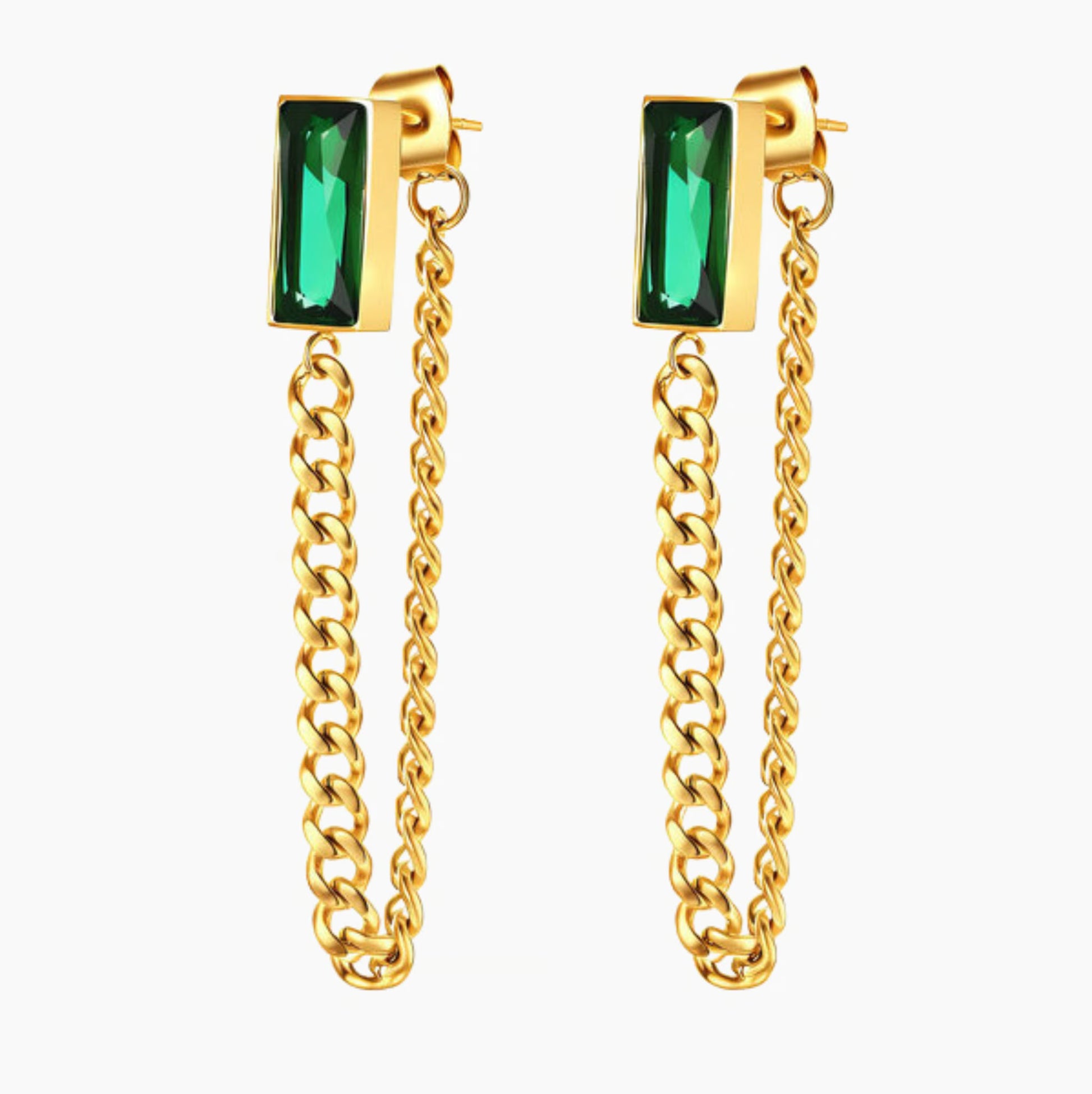 Gold chain earrings with green gemstones on a white background
