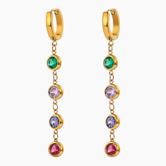 Gold hoop earrings with colorful gemstones on a white background