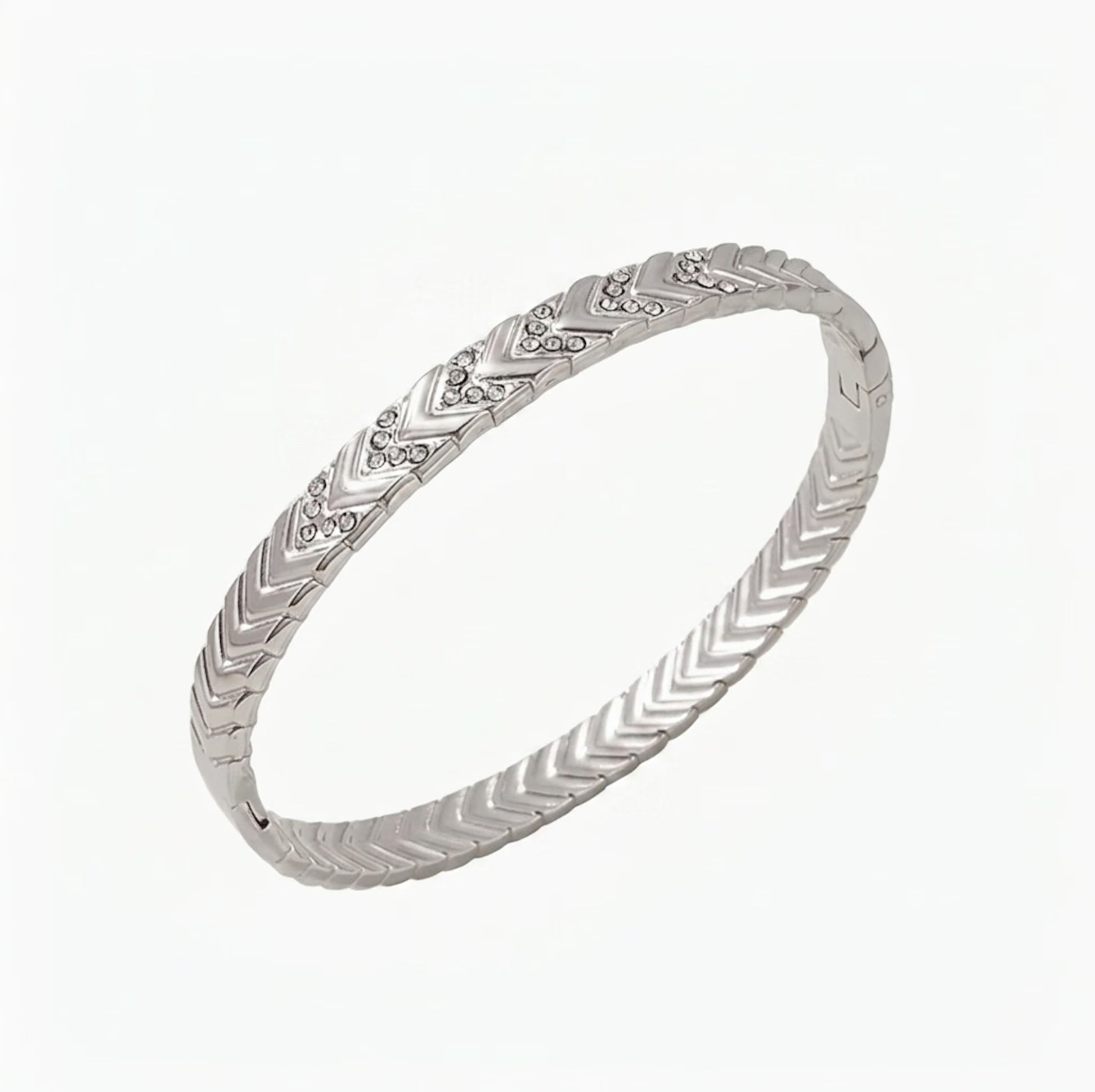 Silver bracelet with letter V design on a white background